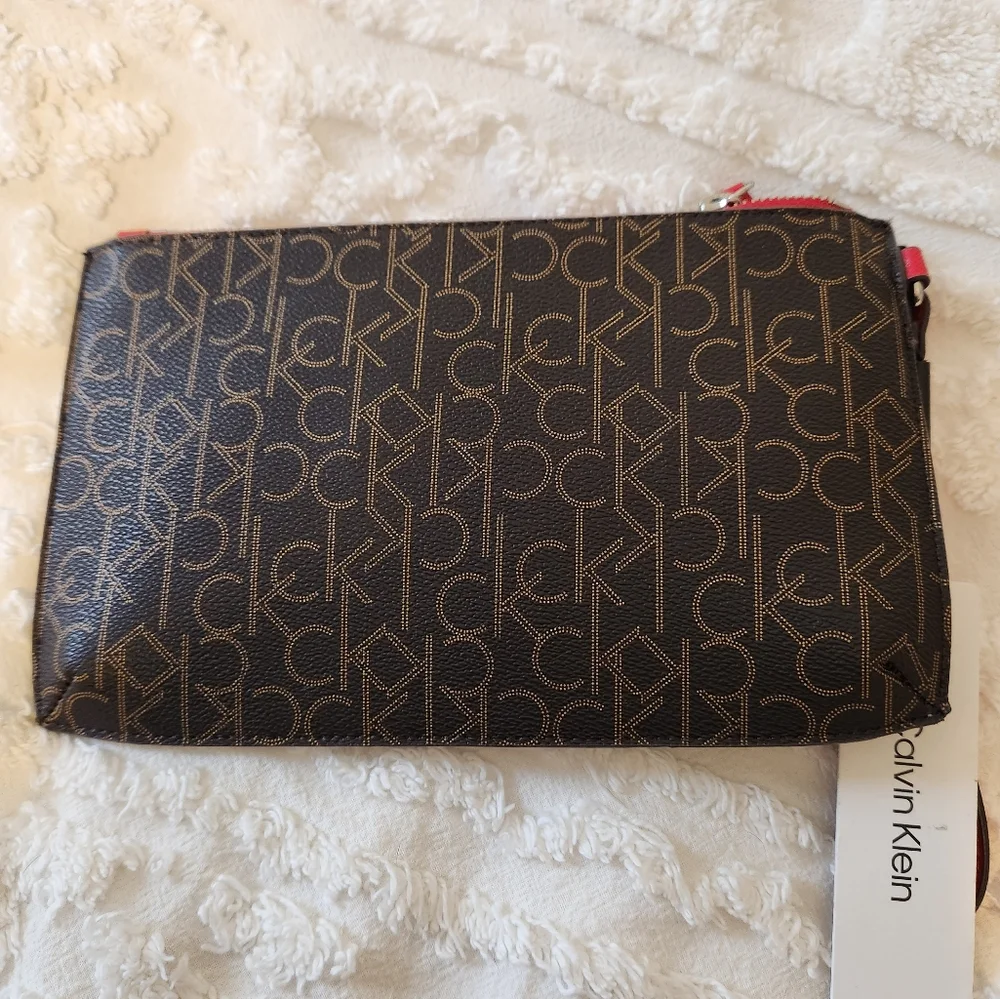 NWT CALVIN KLEIN wristlet.  GREAT COLORS.   10 X 6.5 ORIGINAL PACKING